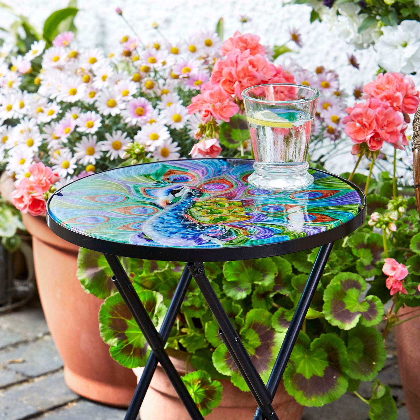 Peacock Table ⸱ sklenený záhradný stolík