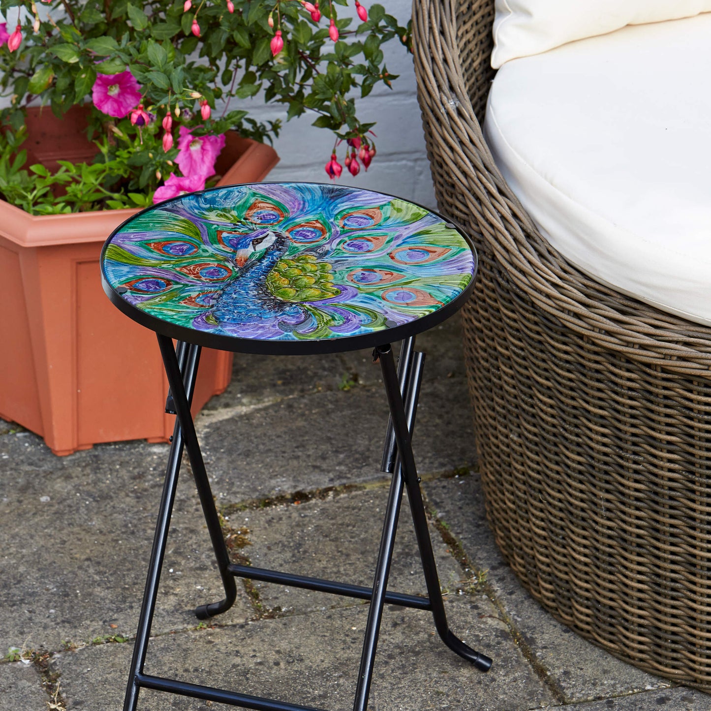 Peacock Table ⸱ sklenený záhradný stolík